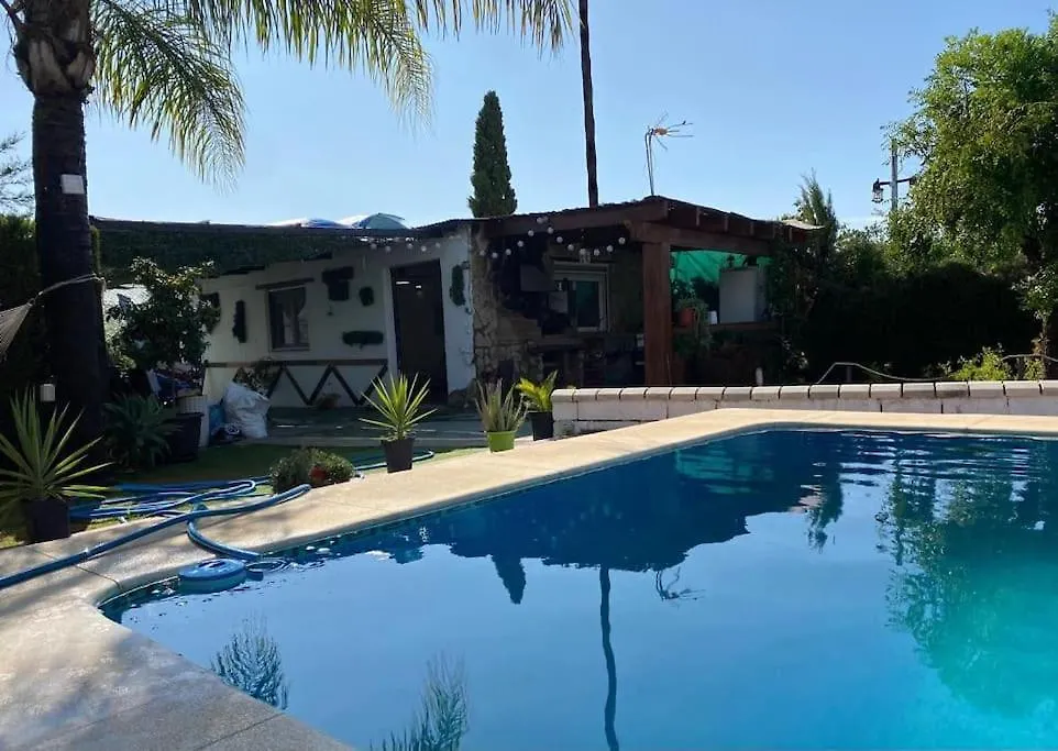 Guest House With Shared Pool. Coria del Río Apartment